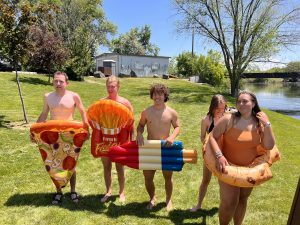 Five friends at the Sandbar in St. Anthony, Idaho; ready to swim!