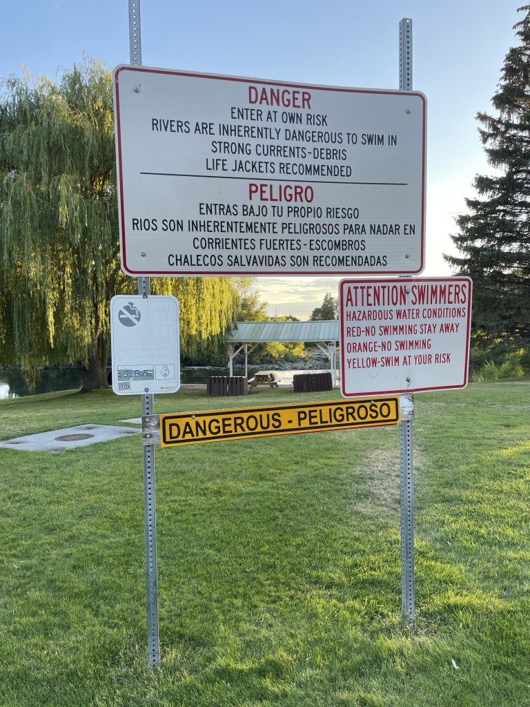 Signs showing the rules at the sandbar in St. Anthony Idaho.