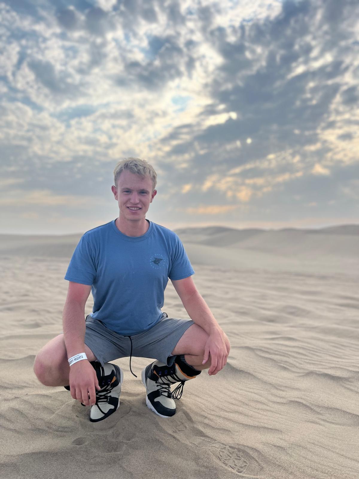 Adam who loves to blog about Rexburg Attractions on his website Things To Do In Rexburg in Peru at the Sand Dunes