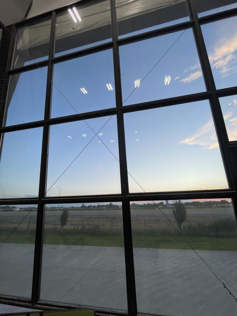 Garage door full of windows at the Rock Gym