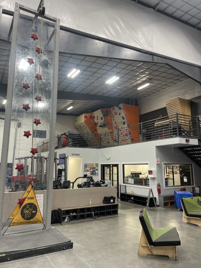 Upper level with cross board and special climbing wall.