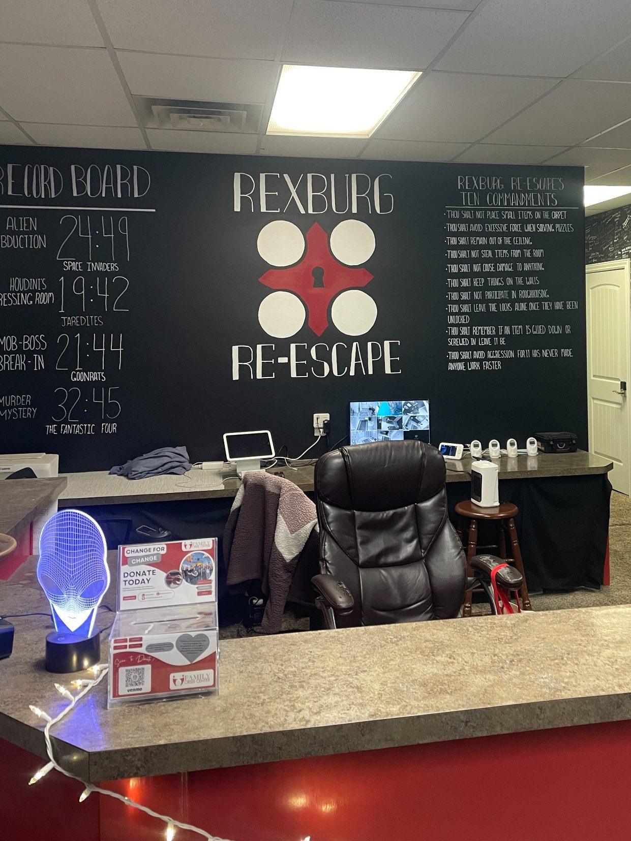 Interior hallway with themed room doors at Rexburg Re-Escape