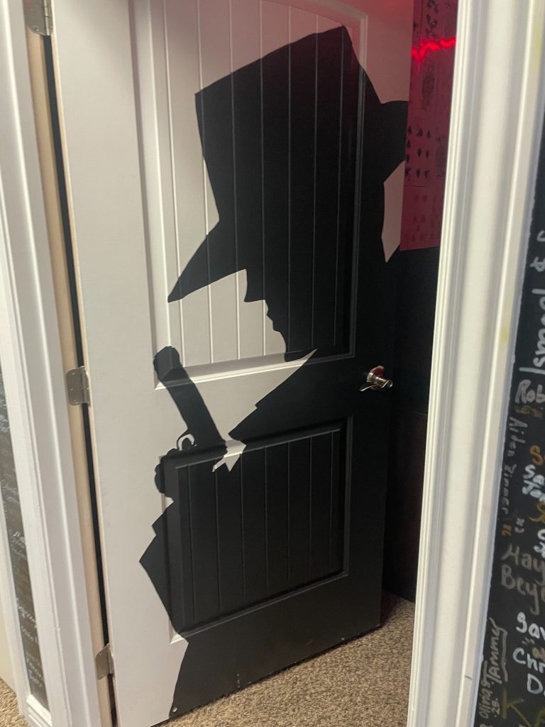 Mystery-themed door inside Rexburg Re-Escape escape room in Rexburg Idaho