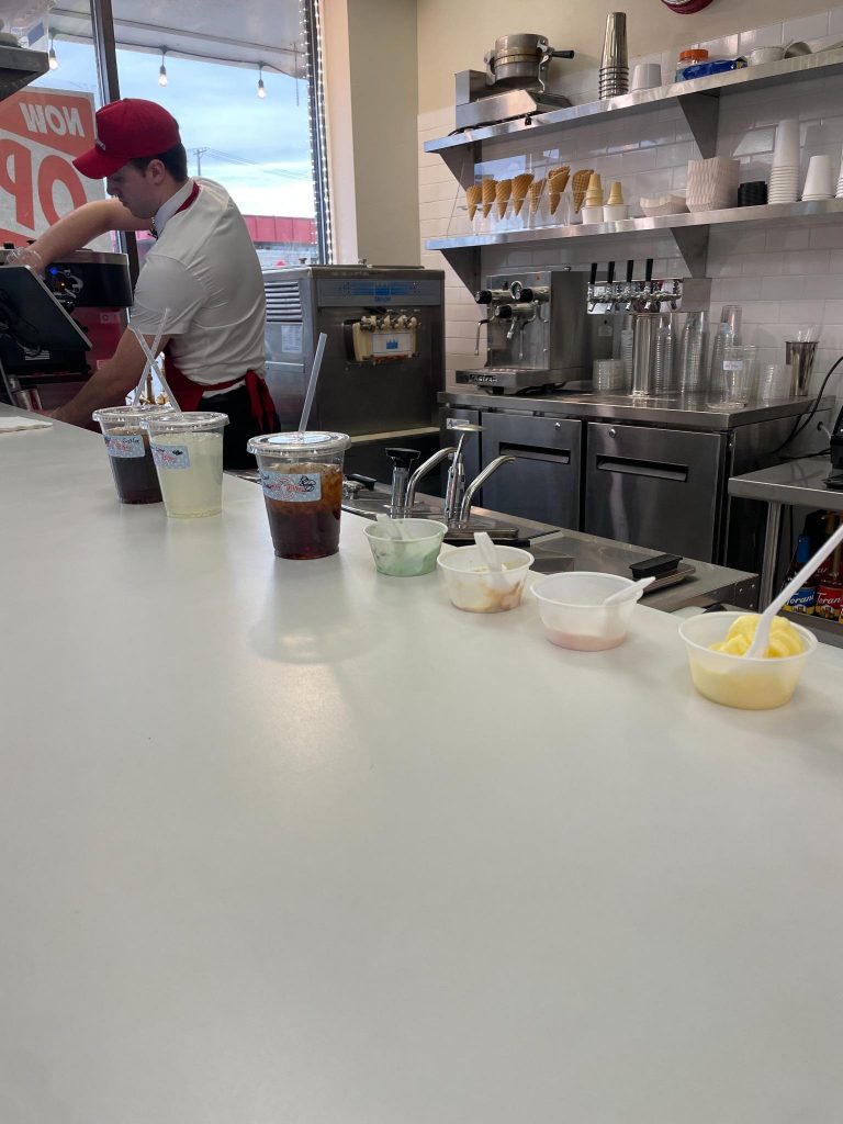 worker preparing drinks at rinky dinks rexburg soda shop