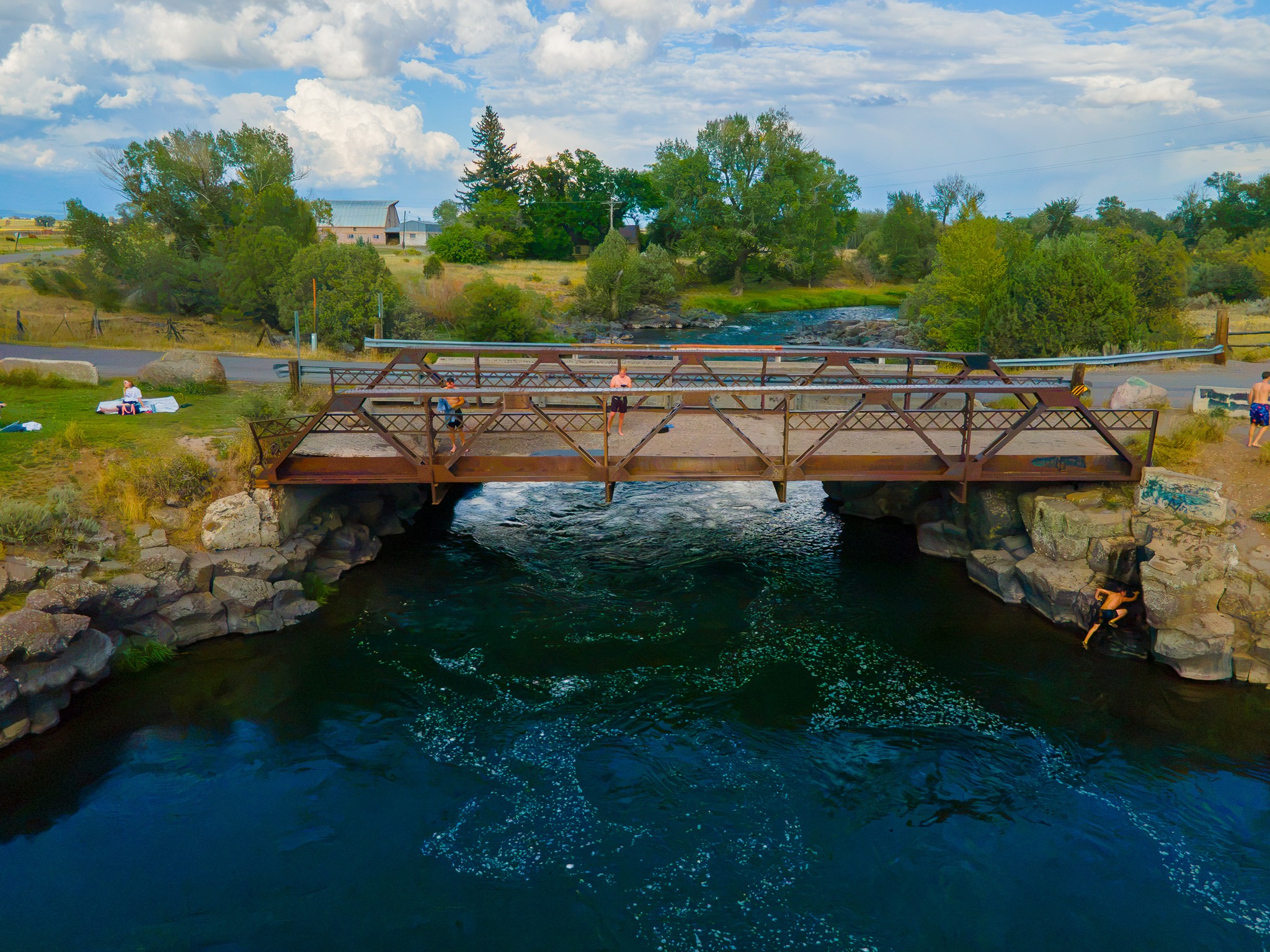 A jumper leaping off Twin Bridges, a popular bridge jumping spot near Rexburg, Idaho