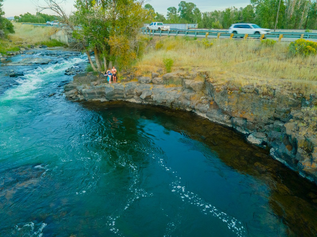 The Fall River swimming hole seen from the highway bridge near Rexburg, Idaho